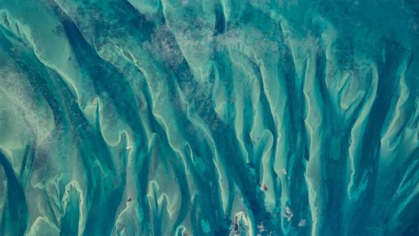Blue-green waters around the Bahamas as seen from the International Space