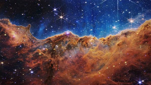 Cosmic Cliffs in the Carina Nebula (© NASA, ESA, CSA, and STScI)