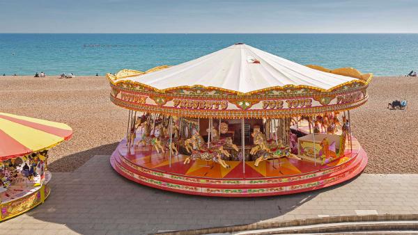 Golden Gallopers Carousel on the seafront in Brighton, East Sussex, England (©