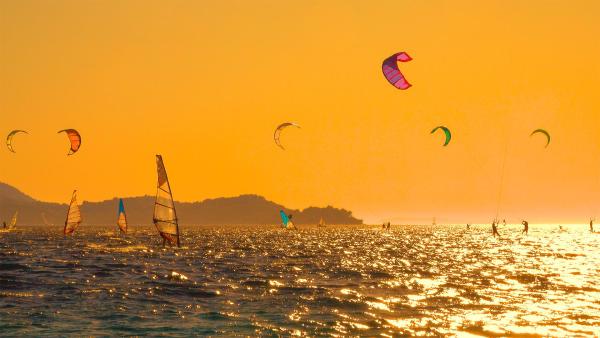 Kiteboarders and windsurfers off the Pelješac Peninsula, Croatia (©