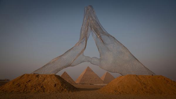 'Together' sculpture by Lorenzo Quinn, Great Pyramids of Giza, Cairo, Egypt (©