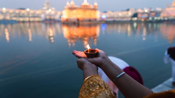 A diya at the Golden Temple during Diwali, Amritsar, India (© EyeEm Mobile GmbH/Getty Images) A diya at the Golden Temple during Diwali, Amritsar, India (© EyeEm Mobile GmbH/Getty Images)