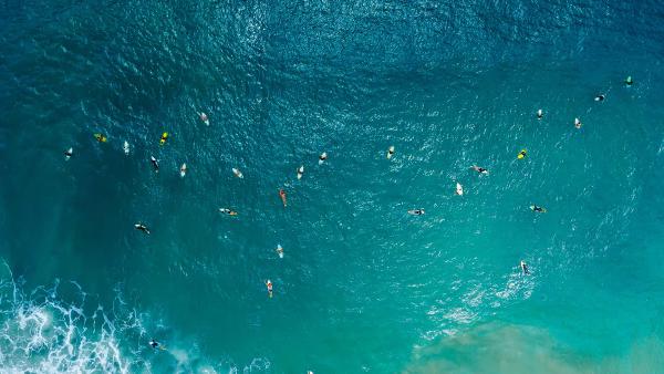 Aerial view of surfers, Santa Catarina, Brazil (© Wonderful Nature/Shutterstock)