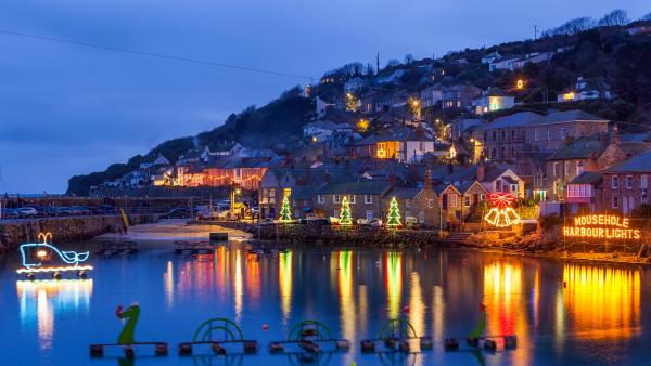 Christmas lights at Mousehole Harbour, Cornwall, England (© ianwool/Getty