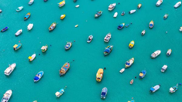 Colorful boats in Marsaxlokk Harbor, Malta (© Klubovy/Getty Images)