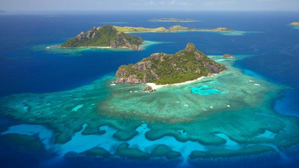 Coral reef surrounding the island of Monuriki, Mamanuca Islands, Fiji (© David Wall/SuperStock)