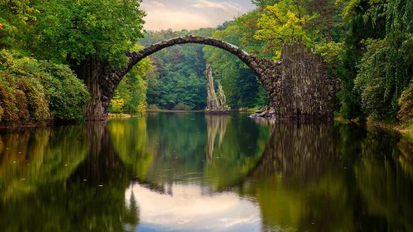 Devil’s Bridge in Rhododendron Park Kromlau, Saxony, Germany (© Mike Mareen/Getty Images)