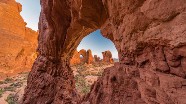 Double Arch seen through Cove Arch, Arches National Park, Utah (© Jeff