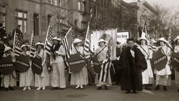 Dr. Anna Howard Shaw leading a suffrage parade in 1910s New York City (© Bettmann/Getty Images)