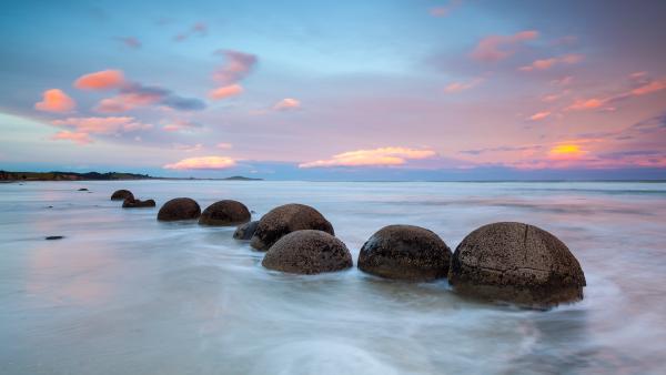 Moeraki Boulders at sunset, South Island, New Zealand (© Douglas Pearson/eStock