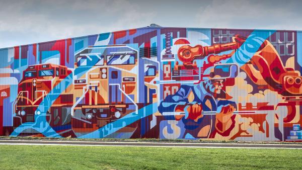 'Power of the Titans' mural by Andrei Krautsou, North Kansas City, Missouri (©