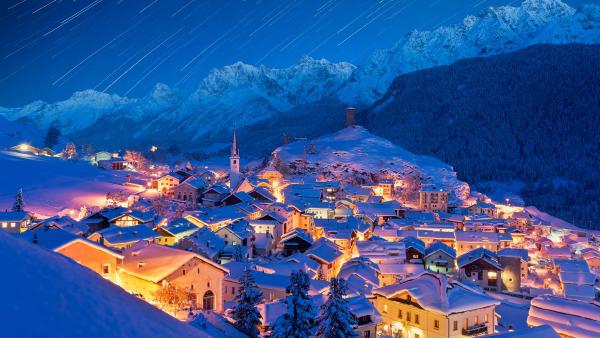 Star trails over Ardez, Graubunden, Switzerland (© Roberto Moiola/Getty Images)