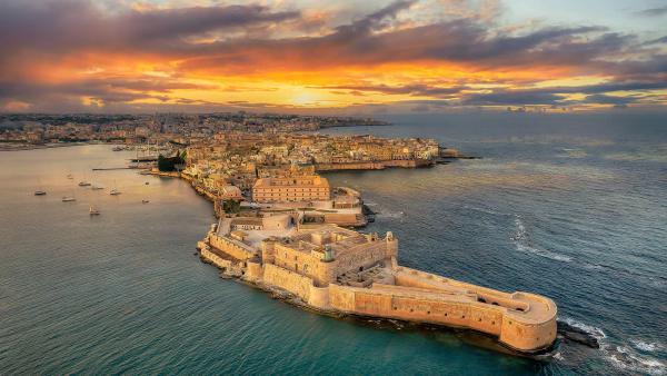 Syracuse at sunset, Sicily, Italy (© Balate Dorin/Getty Images)