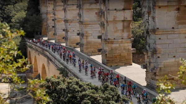 Tour de France cyclists crossing the Pont du Gard, France (© Gonzalo